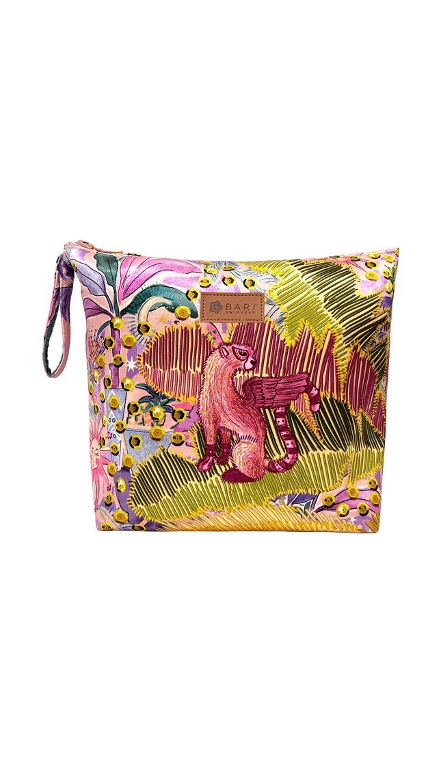 Red Printed Cosmetic Bag Dancing Between Palms