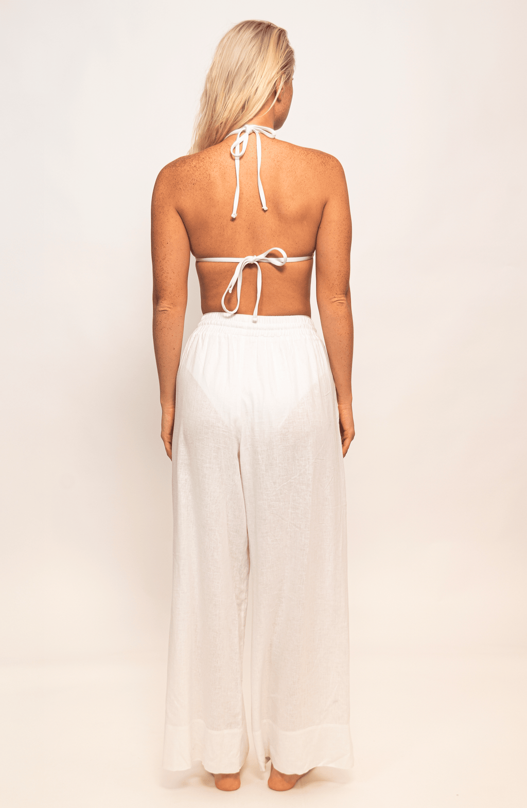 Pantalón Blanco Lino, Colección ODISEA - Bari, los mejores trajes de baño y Bikinis. Diseño y tecnología juntos.