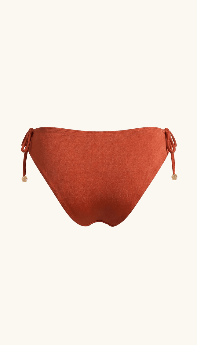 Panty Chica de Bikini Ocre , Colección Alquimia - Bari, los mejores trajes de baño y Bikinis. Diseño y tecnología juntos.