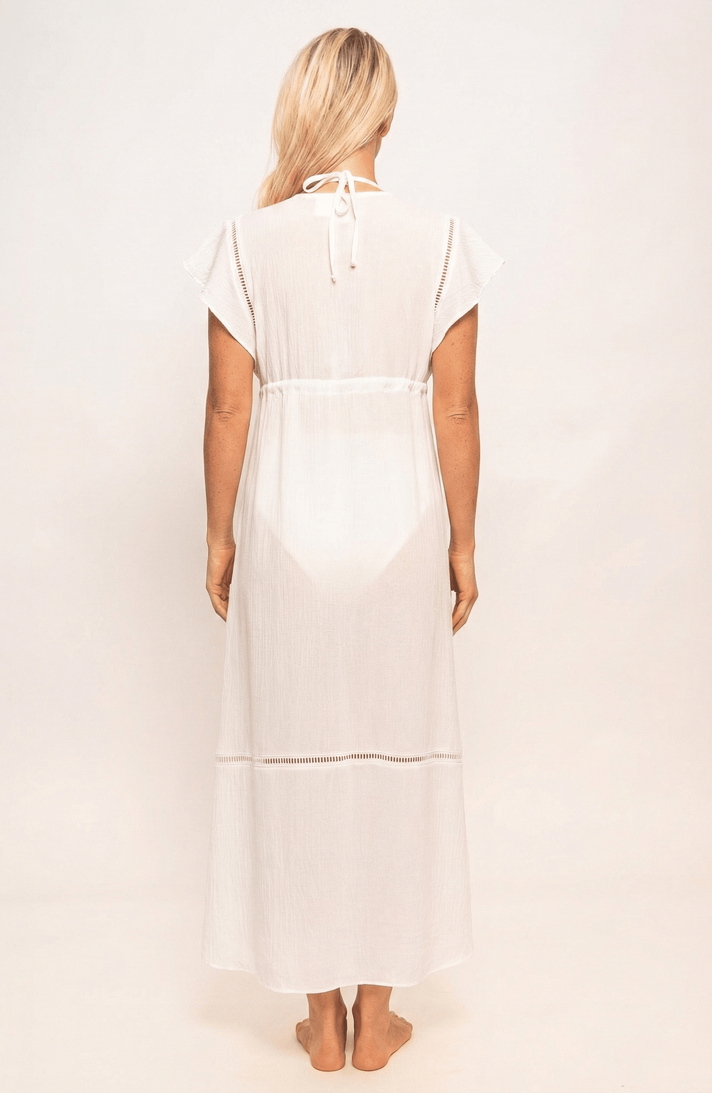 Salida Vestido Blanco, Colección ODISEA - Bari, los mejores trajes de baño y Bikinis. Diseño y tecnología juntos.